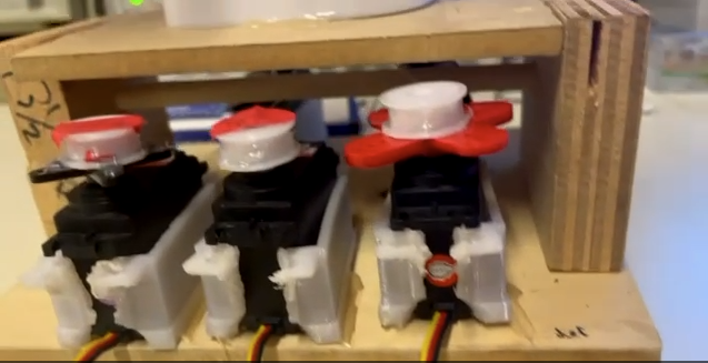 Fishing-wire tendon routing detail